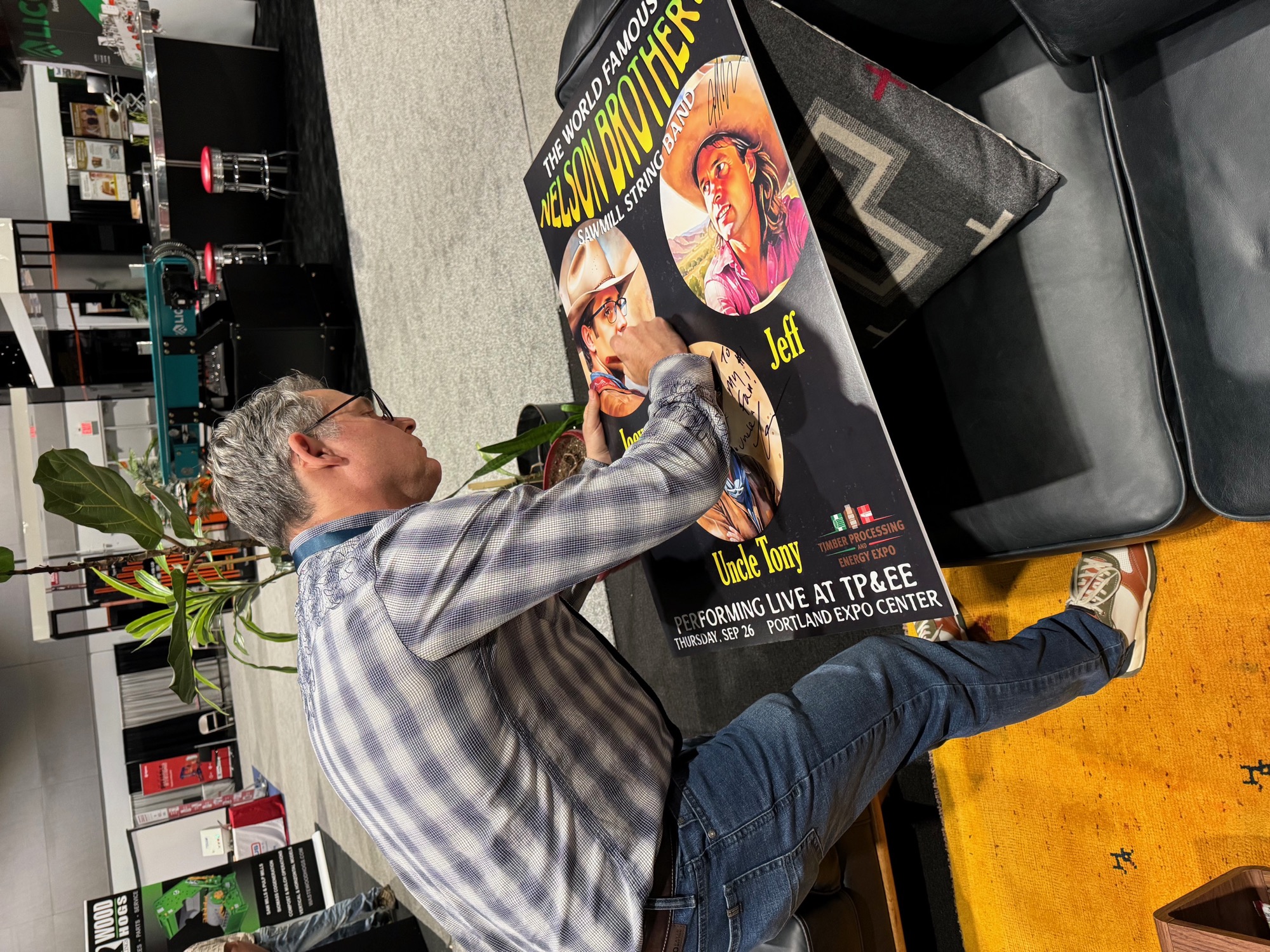 Joey signing the band poster